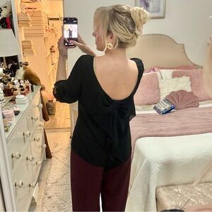 Black Open-Back Blouse with Bow Detail